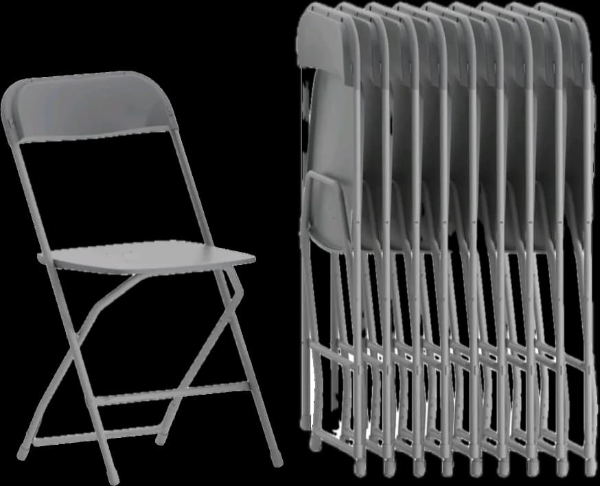 White commercial folding chair with a steel frame, opened and standing on grass